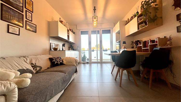 soggiorno con angolo cottura