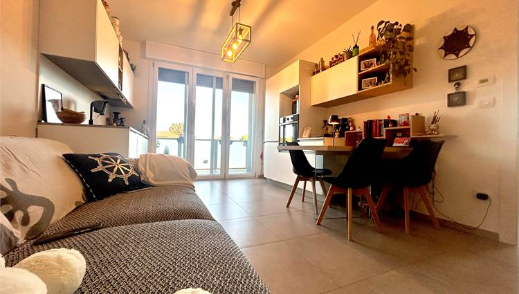 soggiorno con angolo cottura