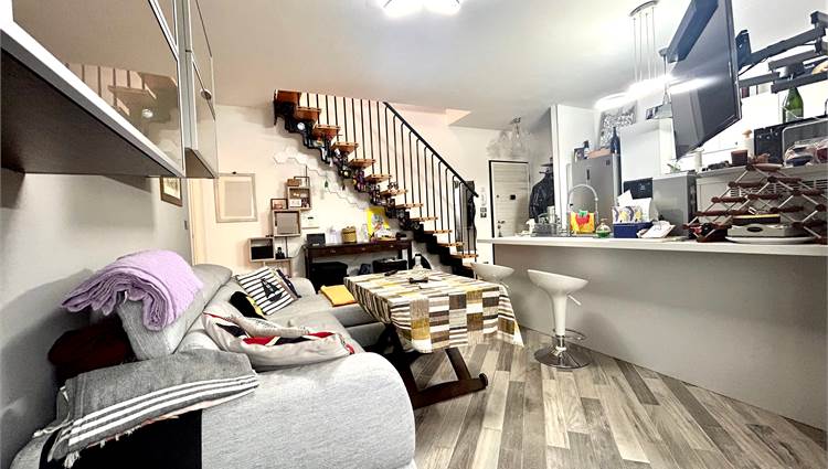 soggiorno con angolo cottura