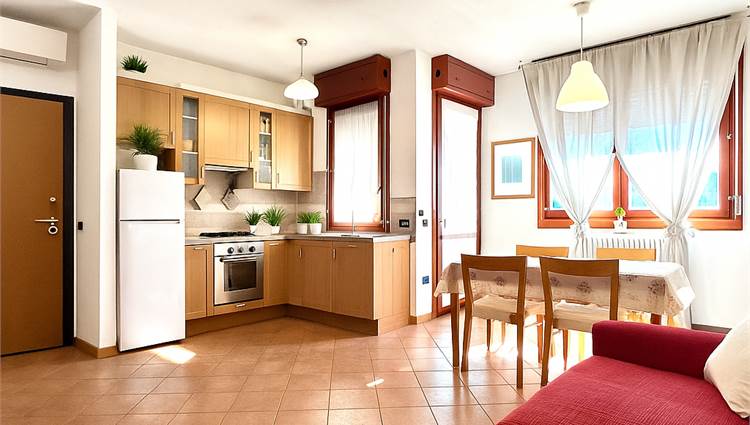 soggiorno con angolo cottura