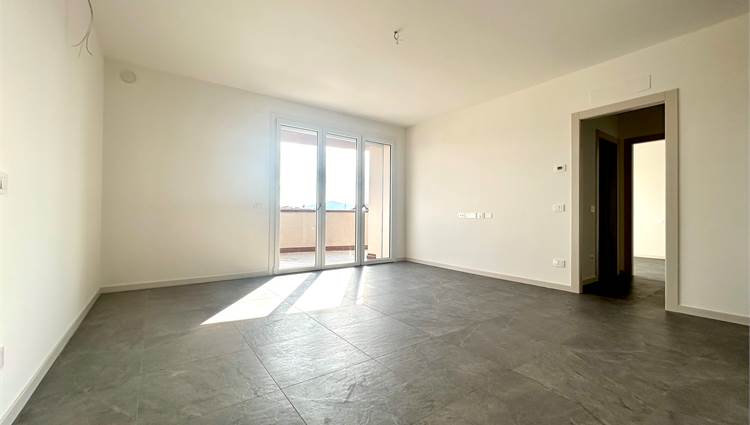 soggiorno con angolo cottura