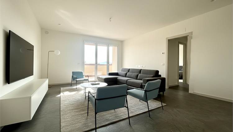 soggiorno con angolo cottura