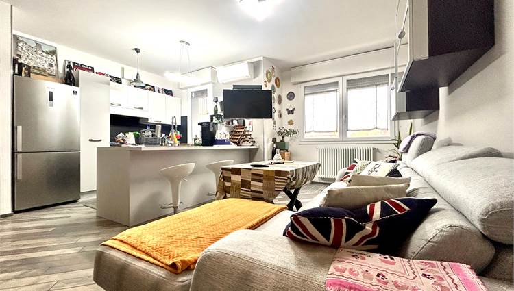 soggiorno con angolo cottura