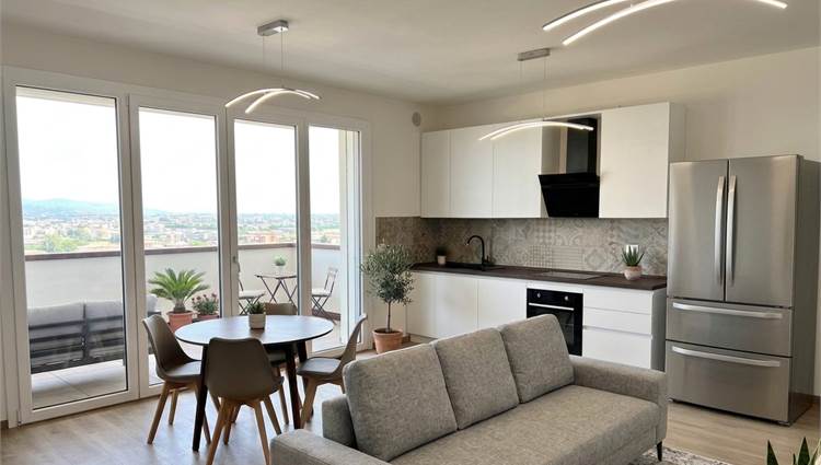 soggiorno con angolo cottura