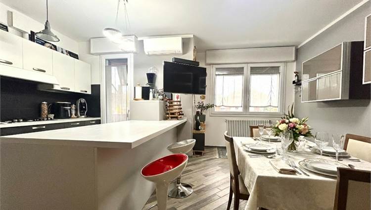 soggiorno con angolo cottura